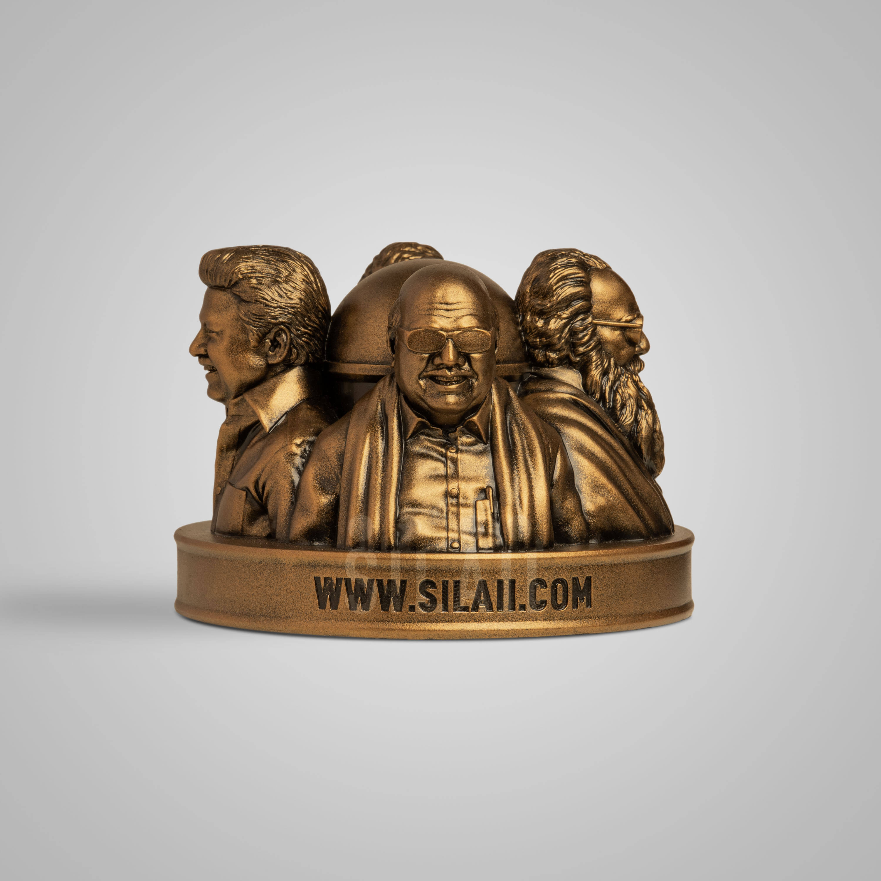 Close-up of the faces of Dravidian leaders sculpture showing intricate hair and facial features