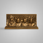 Bronze sculpture of Dravidian leaders with mountain background