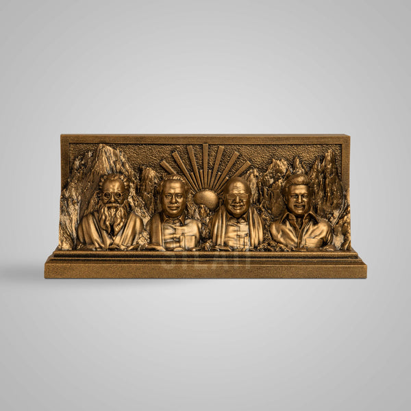 Bronze sculpture of Dravidian leaders with mountain background