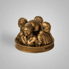 Base of the Dravidian leaders sculpture with website branding and detailed craftsmanship